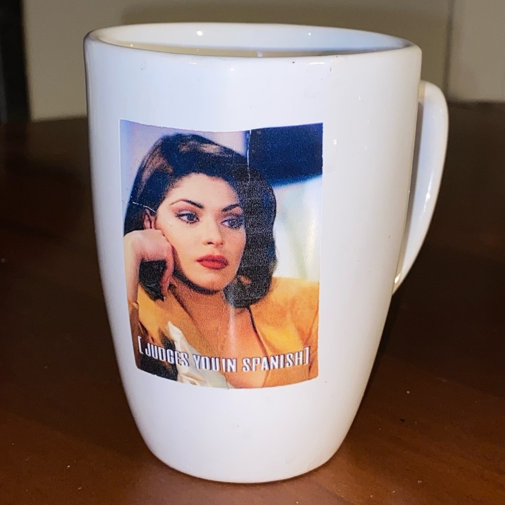 Judges you in Spanish Mug